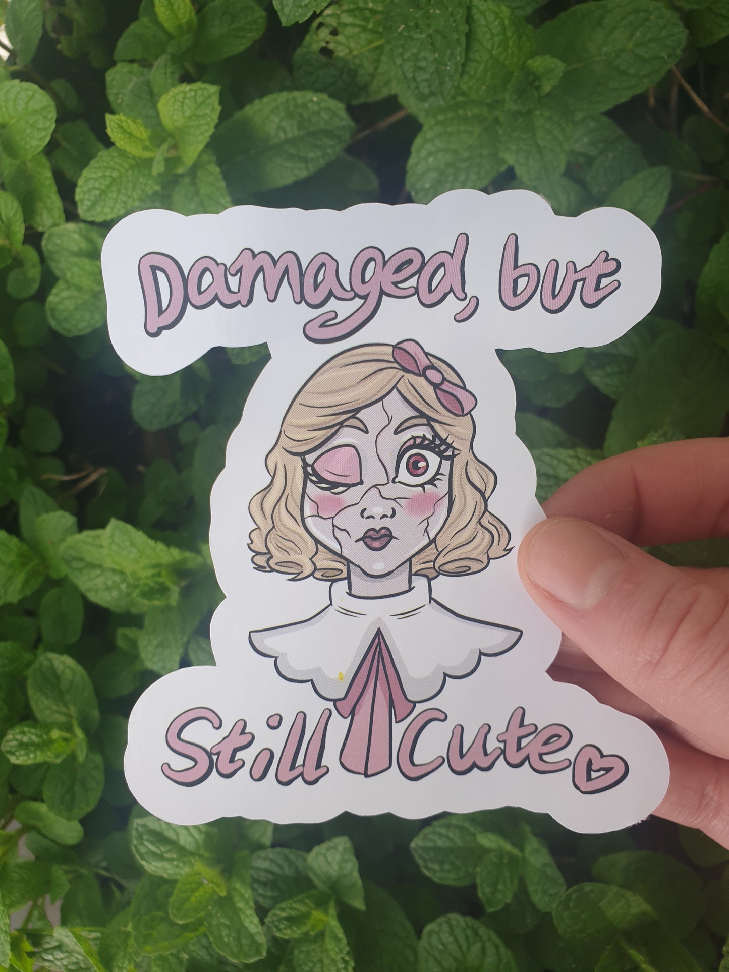 Damaged but Still Cute Doll sticker