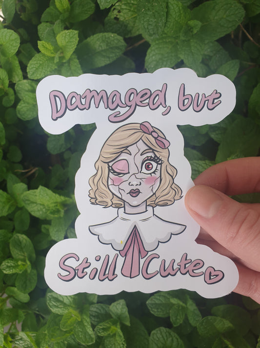 Damaged but Still Cute Doll sticker